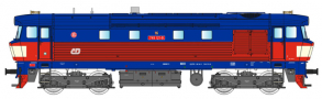 [Lokomotivy] → [Motorov] → [T478.1 „Bardotka”] → 33423: dieselov lokomotiva modr-erven s pruhem na poprs