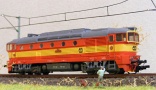 [Lokomotivy] → [Motorov] → [T478.3 „Brejlovec”] → 33312: dieselov lokomotiva erven se lutm vstranm psem