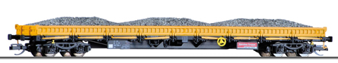 nízkostěnný nákladní vůz žlutý do pracovního vlaku s nákladem štěrku, typ Res