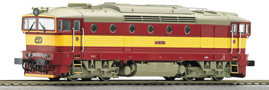 [Lokomotivy] → [Motorov] → [T478.3 „Brejlovec”] → 36258: dieselov lokomotiva erven s vstranm lutm pruhem, ed stecha