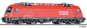 [Lokomotivy] → [Elektrické] → [BR 183] → 04952: elektrická lokomotiva červená s tmavěšedým šedým rámem a pojezdem